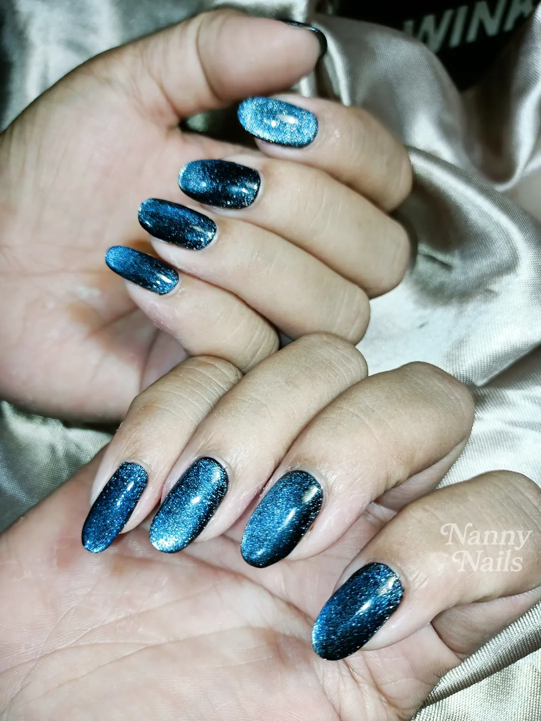 Navy cat eye nails — nail design A14 at Nanny Nails, nail salon in Nakhon Phanom Thailand