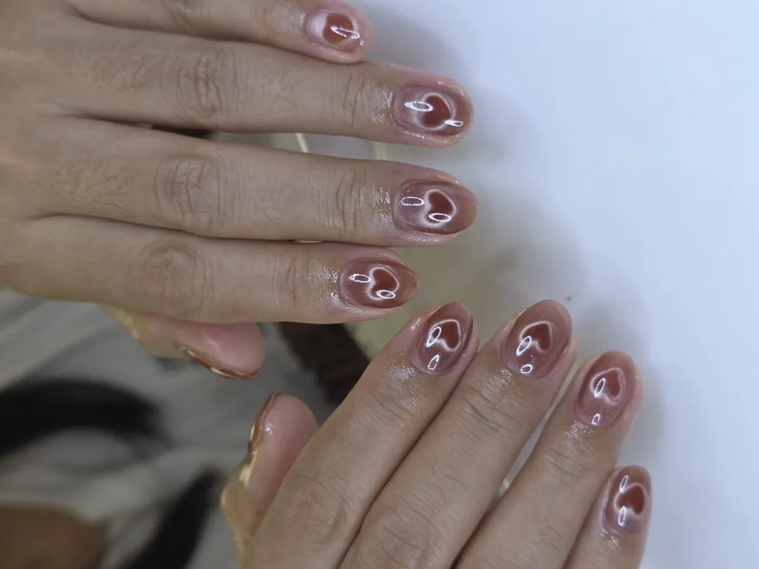 Nude Glossy + ลายหัวใจใส เรียบหวานสไตล์เกาหลี 🤍✨ ลายเล็บมือ นู้ด น้ำตาล รหัส A397 ร้านทำเล็บนครพนม Nanny Nails