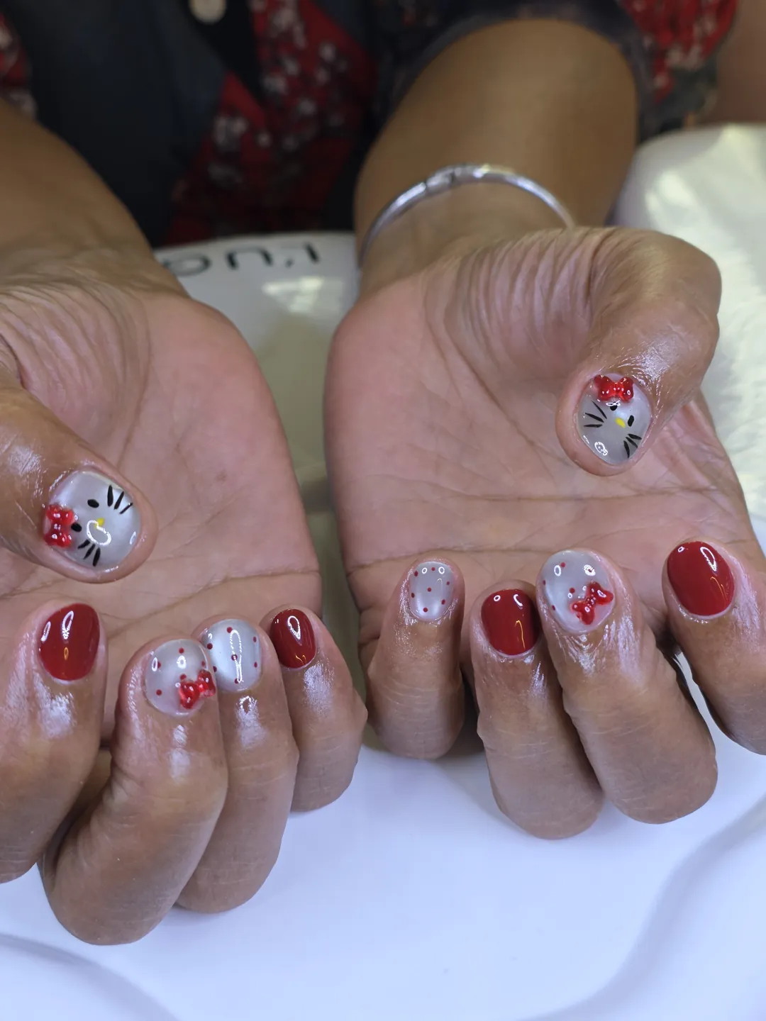 แดง + ลาย Hello Kitty จุดแดง โบว์แดง 🎀 ลายเล็บมือ แดง ขาว นู้ด รหัส A478 ร้านทำเล็บนครพนม Nanny Nails