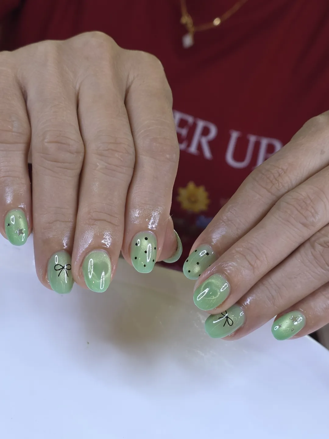 Green hand-painted nails — nail design A489 at Nanny Nails, nail salon in Nakhon Phanom Thailand