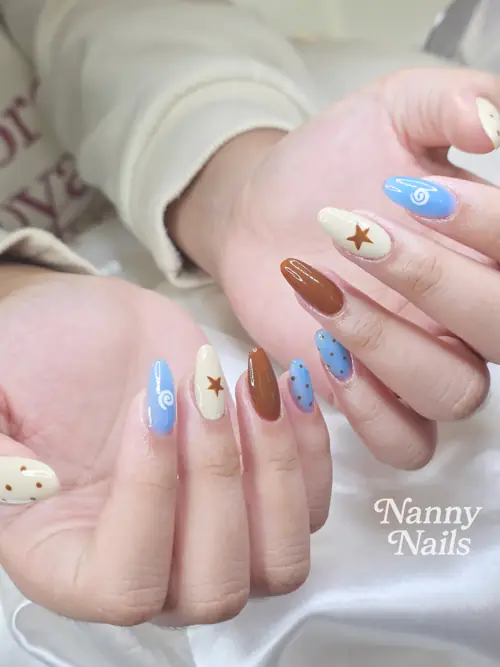 Light blue, Brown & Cream hand-painted nails — nail design A281 at Nanny Nails, nail salon in Nakhon Phanom Thailand