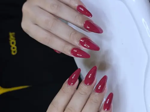 Red solid colour nails — nail design A402 at Nanny Nails, nail salon in Nakhon Phanom Thailand