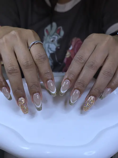 Nude & Gold french, glitter nails — nail design A472 at Nanny Nails, nail salon in Nakhon Phanom Thailand