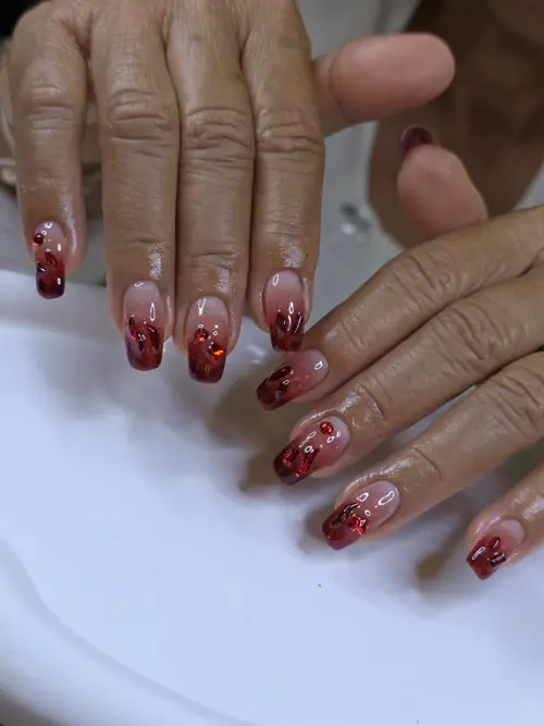 Nude & Red ombré, glitter nails — nail design A473 at Nanny Nails, nail salon in Nakhon Phanom Thailand