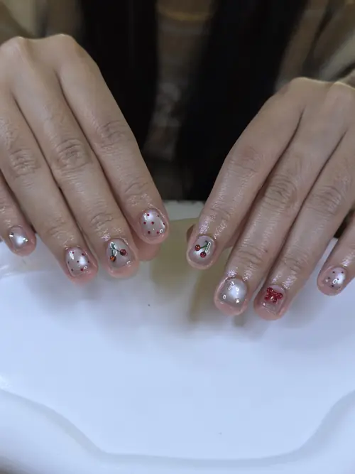Nude & Red hand-painted, rhinestones nails — nail design A476 at Nanny Nails, nail salon in Nakhon Phanom Thailand