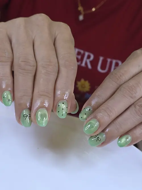 Green hand-painted nails — nail design A489 at Nanny Nails, nail salon in Nakhon Phanom Thailand