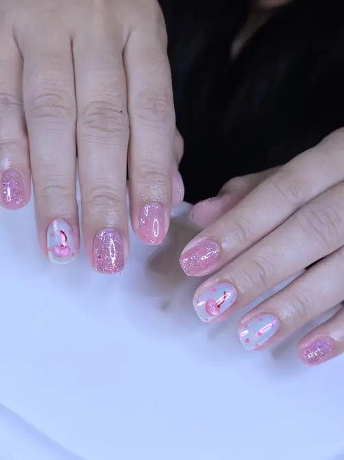 Pink & White glitter, hand-painted nails — nail design A509 at Nanny Nails, nail salon in Nakhon Phanom Thailand