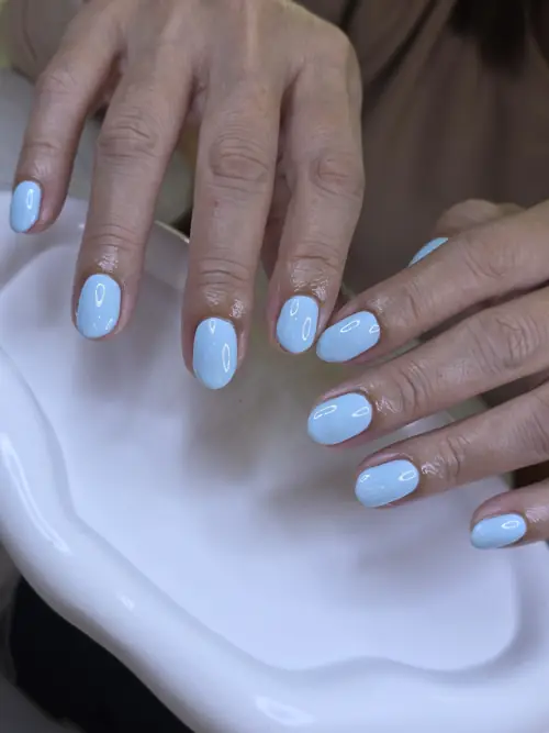 Light blue & White hand-painted nails — nail design A523 at Nanny Nails, nail salon in Nakhon Phanom Thailand
