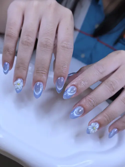 Light blue & White cat eye, hand-painted, 3d sculpted nails — nail design A528 at Nanny Nails, nail salon in Nakhon Phanom Thailand
