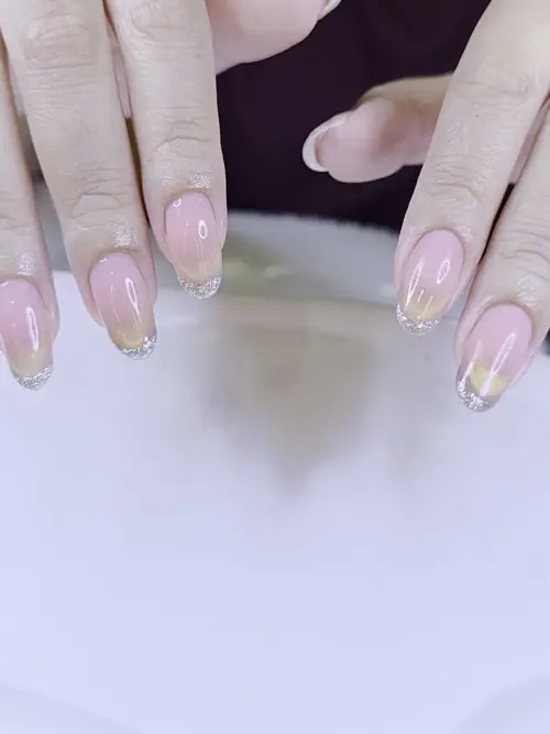Nude & Silver ombré, glitter nails — nail design A555 at Nanny Nails, nail salon in Nakhon Phanom Thailand